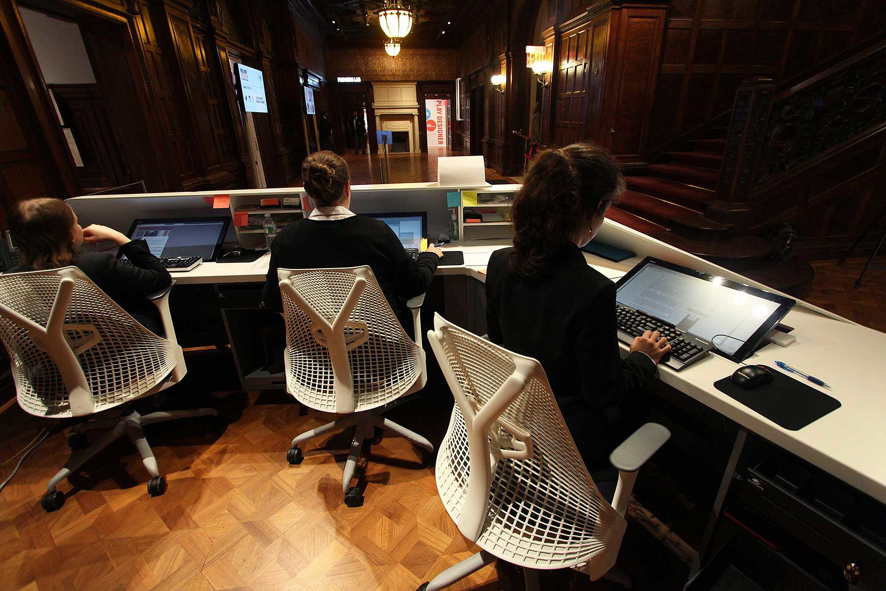 Cooper Hewitt front-desk staff working with custom software and Pen hardware